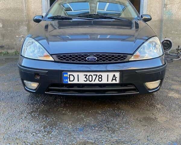 Серый Форд Фокус, объемом двигателя 1.8 л и пробегом 327 тыс. км за 3500 $, фото 9 на Automoto.ua