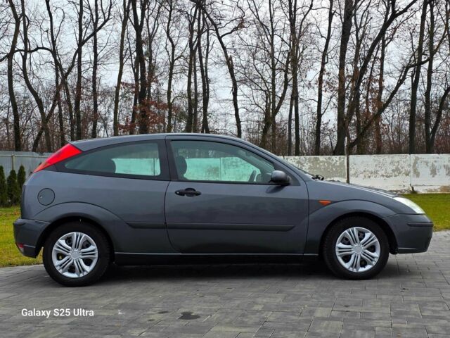 Серый Форд Фокус, объемом двигателя 1.8 л и пробегом 275 тыс. км за 1999 $, фото 3 на Automoto.ua