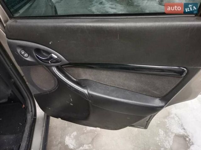 Серый Форд Фокус, объемом двигателя 1.7 л и пробегом 417 тыс. км за 2400 $, фото 17 на Automoto.ua