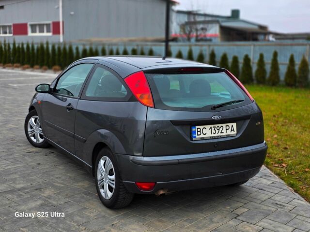 Серый Форд Фокус, объемом двигателя 1.8 л и пробегом 275 тыс. км за 1999 $, фото 16 на Automoto.ua