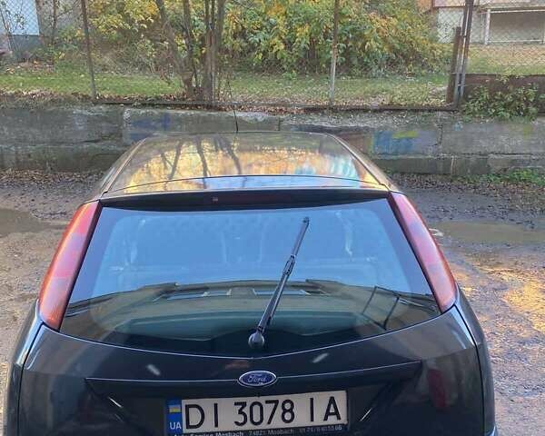 Серый Форд Фокус, объемом двигателя 1.8 л и пробегом 327 тыс. км за 3500 $, фото 6 на Automoto.ua