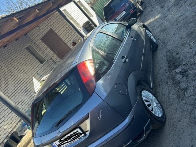 Сірий Форд Фокус, об'ємом двигуна 1.4 л та пробігом 196 тис. км за 1750 $, фото 1 на Automoto.ua