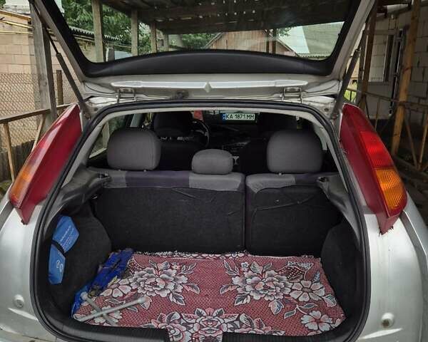 Серый Форд Фокус, объемом двигателя 1.8 л и пробегом 180 тыс. км за 3000 $, фото 12 на Automoto.ua