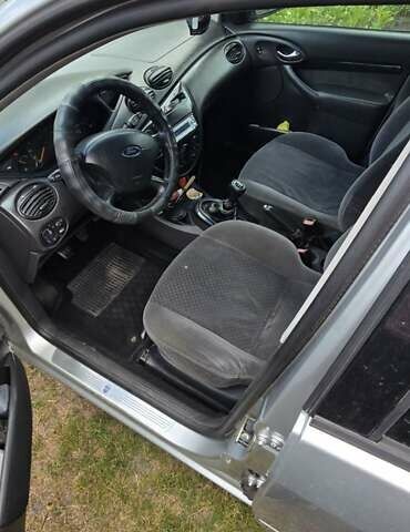 Серый Форд Фокус, объемом двигателя 1.8 л и пробегом 290 тыс. км за 2700 $, фото 4 на Automoto.ua