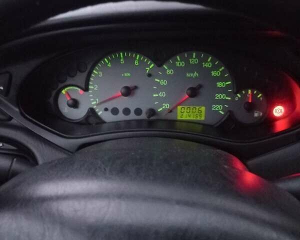 Сірий Форд Фокус, об'ємом двигуна 1.8 л та пробігом 214 тис. км за 2300 $, фото 14 на Automoto.ua