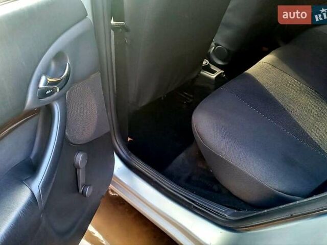 Серый Форд Фокус, объемом двигателя 1.6 л и пробегом 204 тыс. км за 2600 $, фото 3 на Automoto.ua