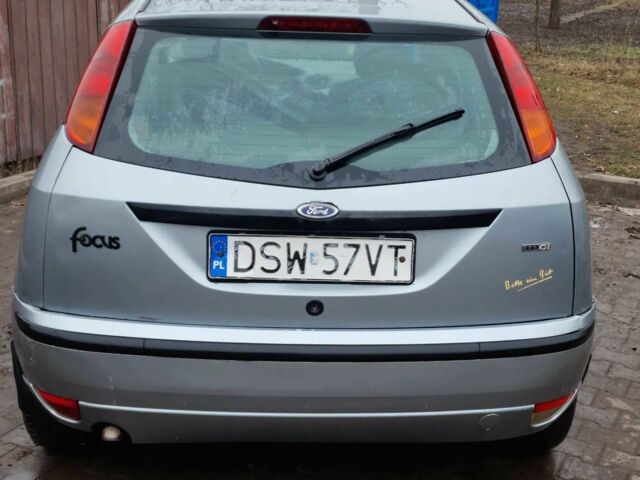 Серый Форд Фокус, объемом двигателя 1.8 л и пробегом 300 тыс. км за 961 $, фото 4 на Automoto.ua