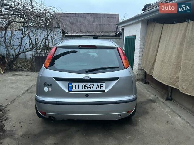Серый Форд Фокус, объемом двигателя 1.6 л и пробегом 364 тыс. км за 3000 $, фото 5 на Automoto.ua