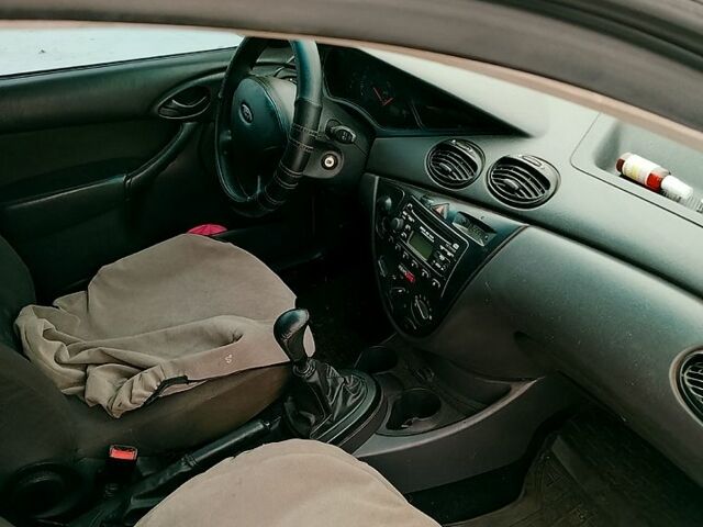 Серый Форд Фокус, объемом двигателя 1.4 л и пробегом 240 тыс. км за 2600 $, фото 3 на Automoto.ua