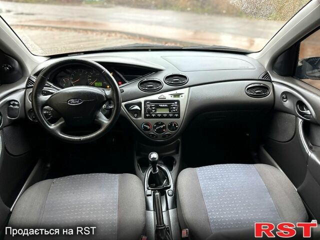 Серый Форд Фокус, объемом двигателя 1.8 л и пробегом 286 тыс. км за 3500 $, фото 12 на Automoto.ua