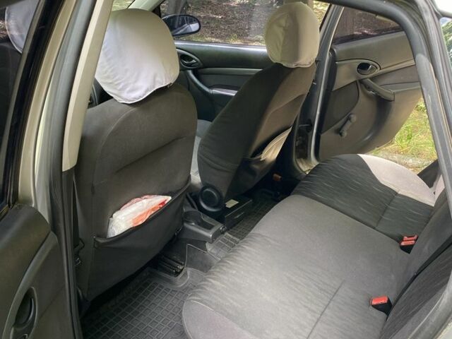 Серый Форд Фокус, объемом двигателя 1.6 л и пробегом 212 тыс. км за 4000 $, фото 5 на Automoto.ua