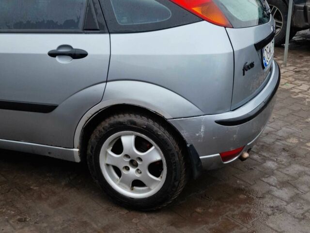 Серый Форд Фокус, объемом двигателя 1.8 л и пробегом 300 тыс. км за 961 $, фото 5 на Automoto.ua