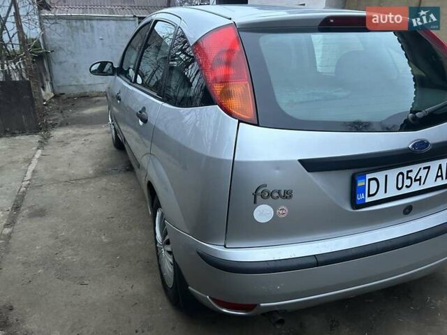 Серый Форд Фокус, объемом двигателя 1.6 л и пробегом 364 тыс. км за 3000 $, фото 3 на Automoto.ua