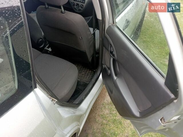 Серый Форд Фокус, объемом двигателя 1.8 л и пробегом 246 тыс. км за 2250 $, фото 10 на Automoto.ua