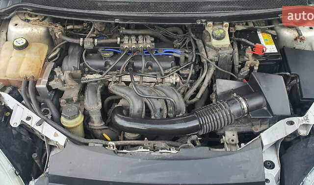 Сірий Форд Фокус, об'ємом двигуна 1.6 л та пробігом 214 тис. км за 3600 $, фото 21 на Automoto.ua