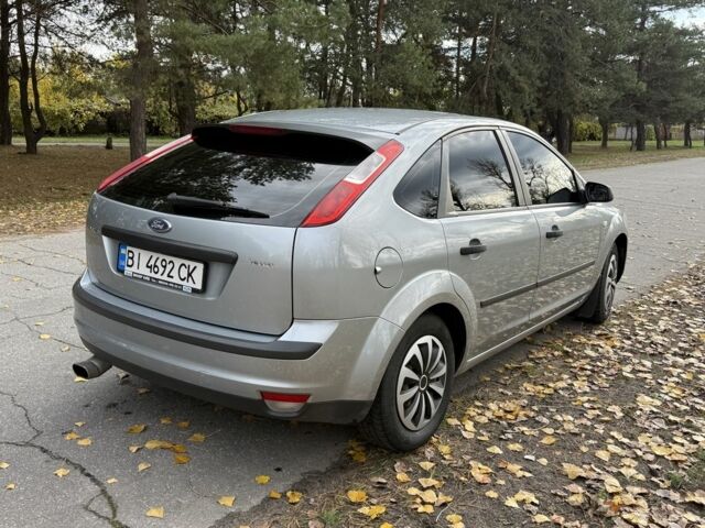 Серый Форд Фокус, объемом двигателя 1.4 л и пробегом 265 тыс. км за 4400 $, фото 4 на Automoto.ua
