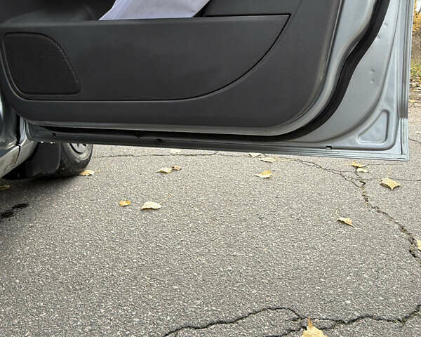 Сірий Форд Фокус, об'ємом двигуна 1.39 л та пробігом 265 тис. км за 4400 $, фото 27 на Automoto.ua