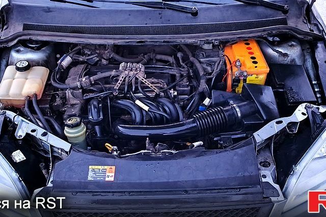 Сірий Форд Фокус, об'ємом двигуна 1.4 л та пробігом 257 тис. км за 4500 $, фото 5 на Automoto.ua