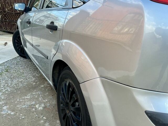 Серый Форд Фокус, объемом двигателя 1.4 л и пробегом 219 тыс. км за 4396 $, фото 2 на Automoto.ua