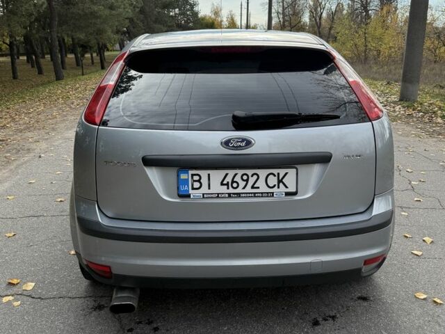 Серый Форд Фокус, объемом двигателя 1.4 л и пробегом 265 тыс. км за 4400 $, фото 6 на Automoto.ua