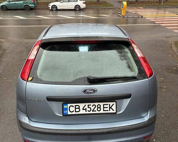 Серый Форд Фокус, объемом двигателя 1.6 л и пробегом 243 тыс. км за 4000 $, фото 2 на Automoto.ua