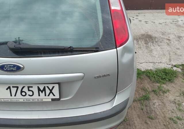 Серый Форд Фокус, объемом двигателя 1.6 л и пробегом 335 тыс. км за 3990 $, фото 8 на Automoto.ua
