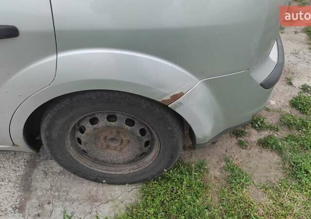 Серый Форд Фокус, объемом двигателя 1.6 л и пробегом 335 тыс. км за 3990 $, фото 7 на Automoto.ua