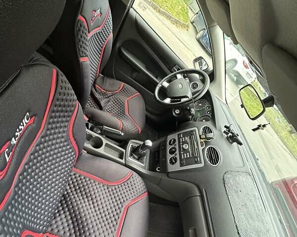 Серый Форд Фокус, объемом двигателя 1.6 л и пробегом 219 тыс. км за 3500 $, фото 11 на Automoto.ua