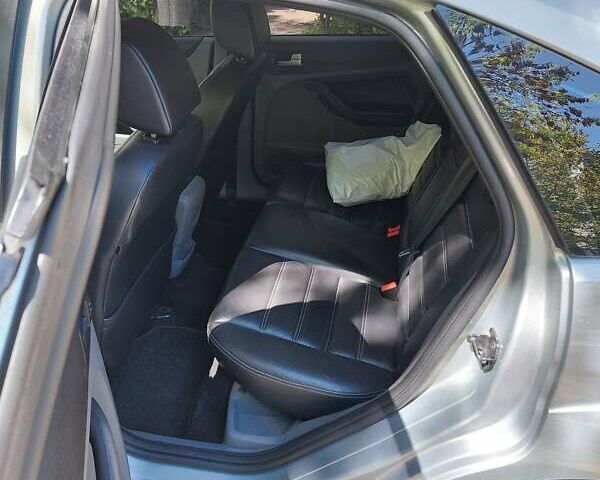 Серый Форд Фокус, объемом двигателя 1.8 л и пробегом 185 тыс. км за 4999 $, фото 7 на Automoto.ua