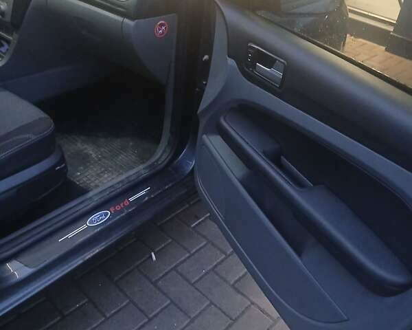 Серый Форд Фокус, объемом двигателя 1.6 л и пробегом 297 тыс. км за 4800 $, фото 8 на Automoto.ua