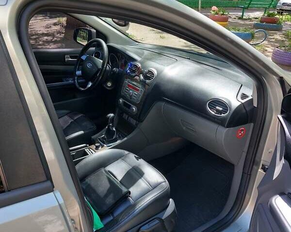 Серый Форд Фокус, объемом двигателя 1.8 л и пробегом 185 тыс. км за 4999 $, фото 8 на Automoto.ua