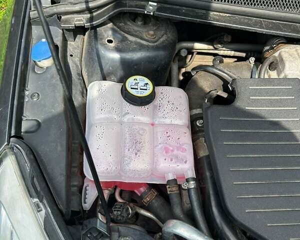 Серый Форд Фокус, объемом двигателя 1.8 л и пробегом 293 тыс. км за 5000 $, фото 17 на Automoto.ua