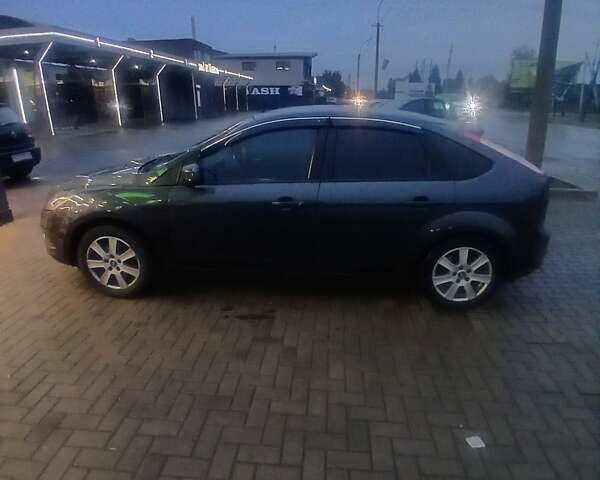 Серый Форд Фокус, объемом двигателя 1.6 л и пробегом 297 тыс. км за 4800 $, фото 6 на Automoto.ua