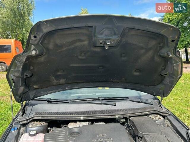 Серый Форд Фокус, объемом двигателя 1.8 л и пробегом 293 тыс. км за 5000 $, фото 16 на Automoto.ua