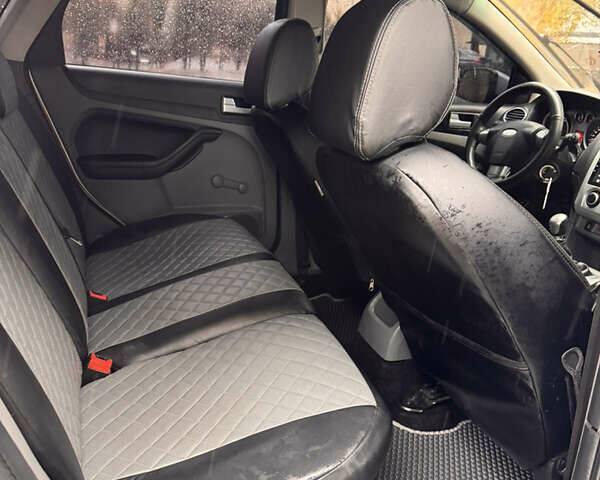 Серый Форд Фокус, объемом двигателя 1.6 л и пробегом 307 тыс. км за 4350 $, фото 16 на Automoto.ua