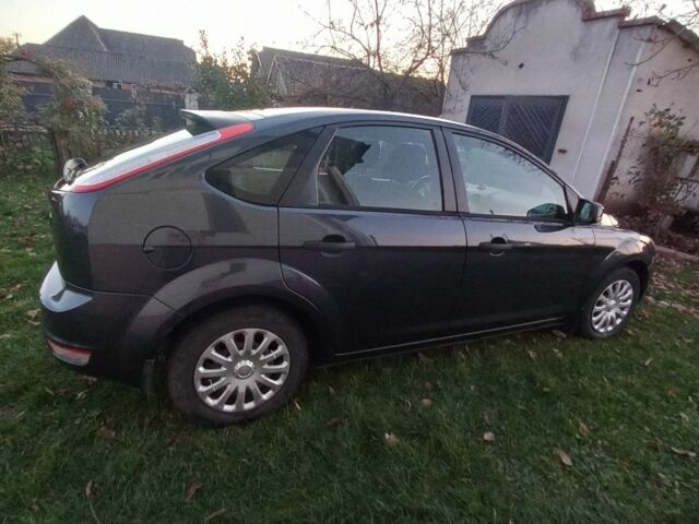 Серый Форд Фокус, объемом двигателя 1.4 л и пробегом 120 тыс. км за 5300 $, фото 3 на Automoto.ua