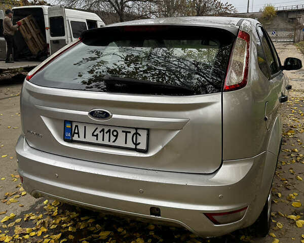Серый Форд Фокус, объемом двигателя 1.39 л и пробегом 228 тыс. км за 3999 $, фото 11 на Automoto.ua