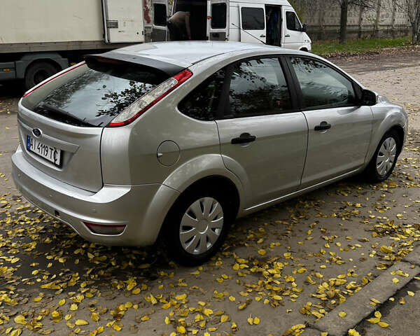 Серый Форд Фокус, объемом двигателя 1.39 л и пробегом 228 тыс. км за 3999 $, фото 12 на Automoto.ua