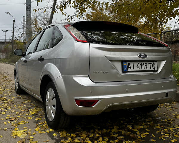 Серый Форд Фокус, объемом двигателя 1.39 л и пробегом 228 тыс. км за 3999 $, фото 17 на Automoto.ua