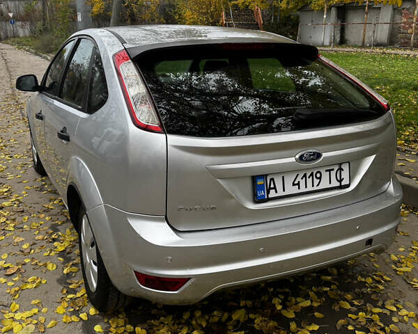 Серый Форд Фокус, объемом двигателя 1.39 л и пробегом 228 тыс. км за 3999 $, фото 16 на Automoto.ua