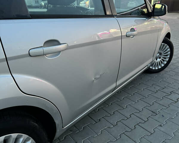 Серый Форд Фокус, объемом двигателя 1.8 л и пробегом 220 тыс. км за 4800 $, фото 5 на Automoto.ua