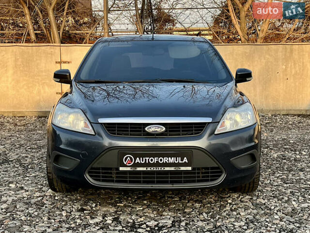 Серый Форд Фокус, объемом двигателя 1.4 л и пробегом 220 тыс. км за 5790 $, фото 2 на Automoto.ua