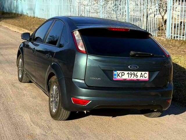 Серый Форд Фокус, объемом двигателя 1.4 л и пробегом 186 тыс. км за 6600 $, фото 2 на Automoto.ua