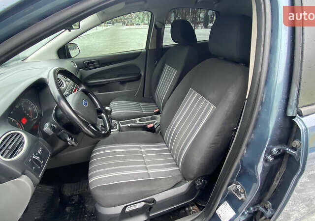 Серый Форд Фокус, объемом двигателя 1.39 л и пробегом 350 тыс. км за 4199 $, фото 10 на Automoto.ua