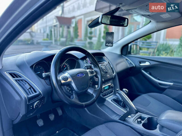 Сірий Форд Фокус, об'ємом двигуна 1.6 л та пробігом 235 тис. км за 7450 $, фото 42 на Automoto.ua