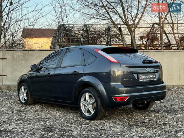 Серый Форд Фокус, объемом двигателя 1.4 л и пробегом 220 тыс. км за 5790 $, фото 4 на Automoto.ua