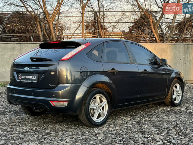 Серый Форд Фокус, объемом двигателя 1.4 л и пробегом 220 тыс. км за 5790 $, фото 6 на Automoto.ua