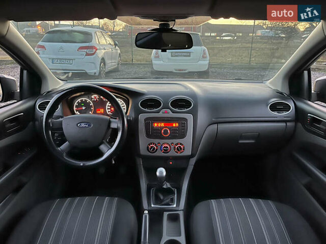 Серый Форд Фокус, объемом двигателя 1.4 л и пробегом 220 тыс. км за 5790 $, фото 11 на Automoto.ua