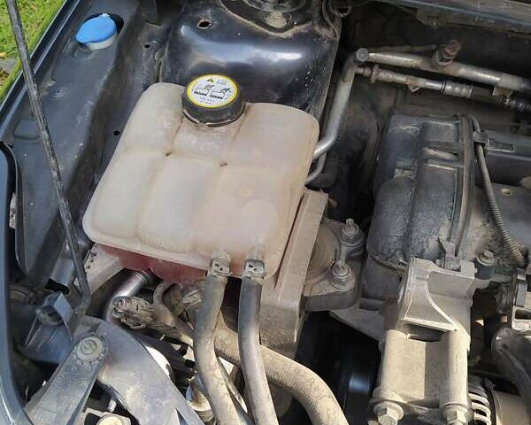 Сірий Форд Фокус, об'ємом двигуна 1.6 л та пробігом 92 тис. км за 6800 $, фото 29 на Automoto.ua