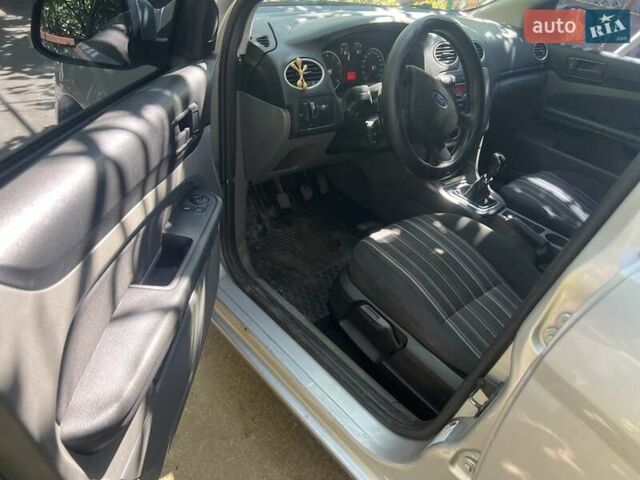 Серый Форд Фокус, объемом двигателя 1.4 л и пробегом 251 тыс. км за 4999 $, фото 6 на Automoto.ua